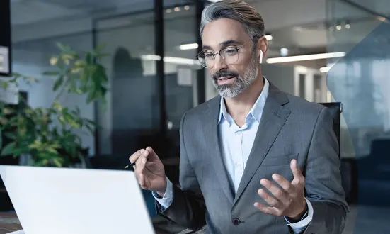 Businessman in video conference discussing MiFID II-compliant recording